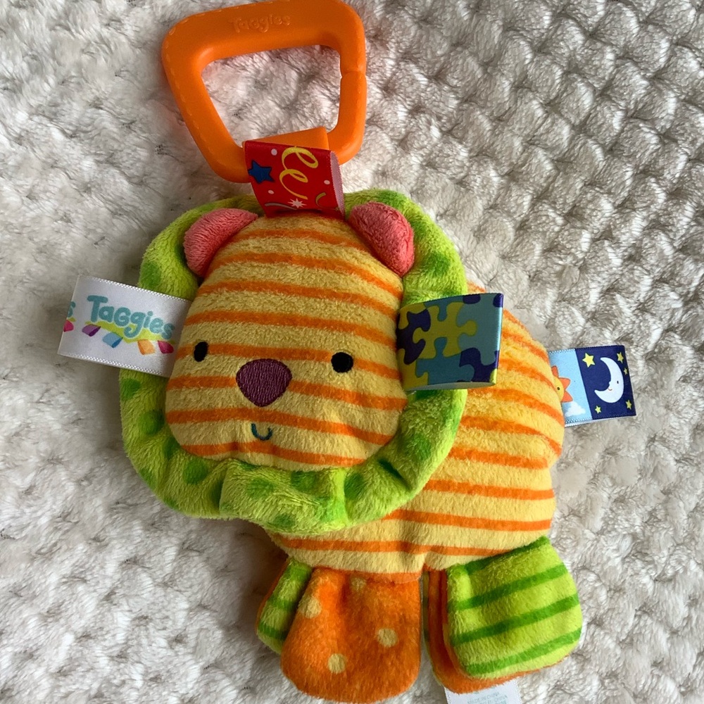 Taggies Plush Lion Squeeze Squeaker Hanging Stuffed Animal Toy